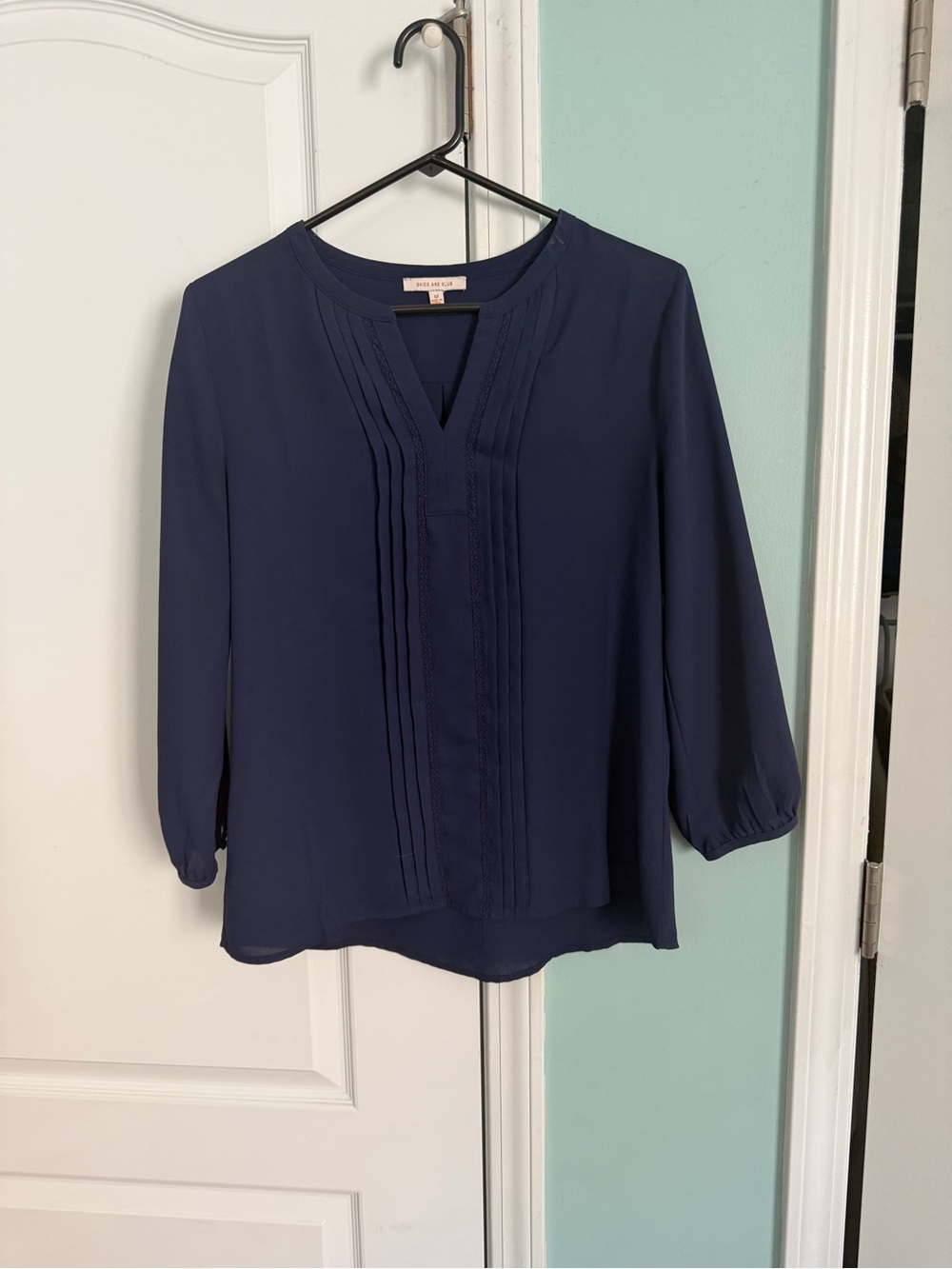 Skies Are Blue Navy Pintuck V-Neck Blouse